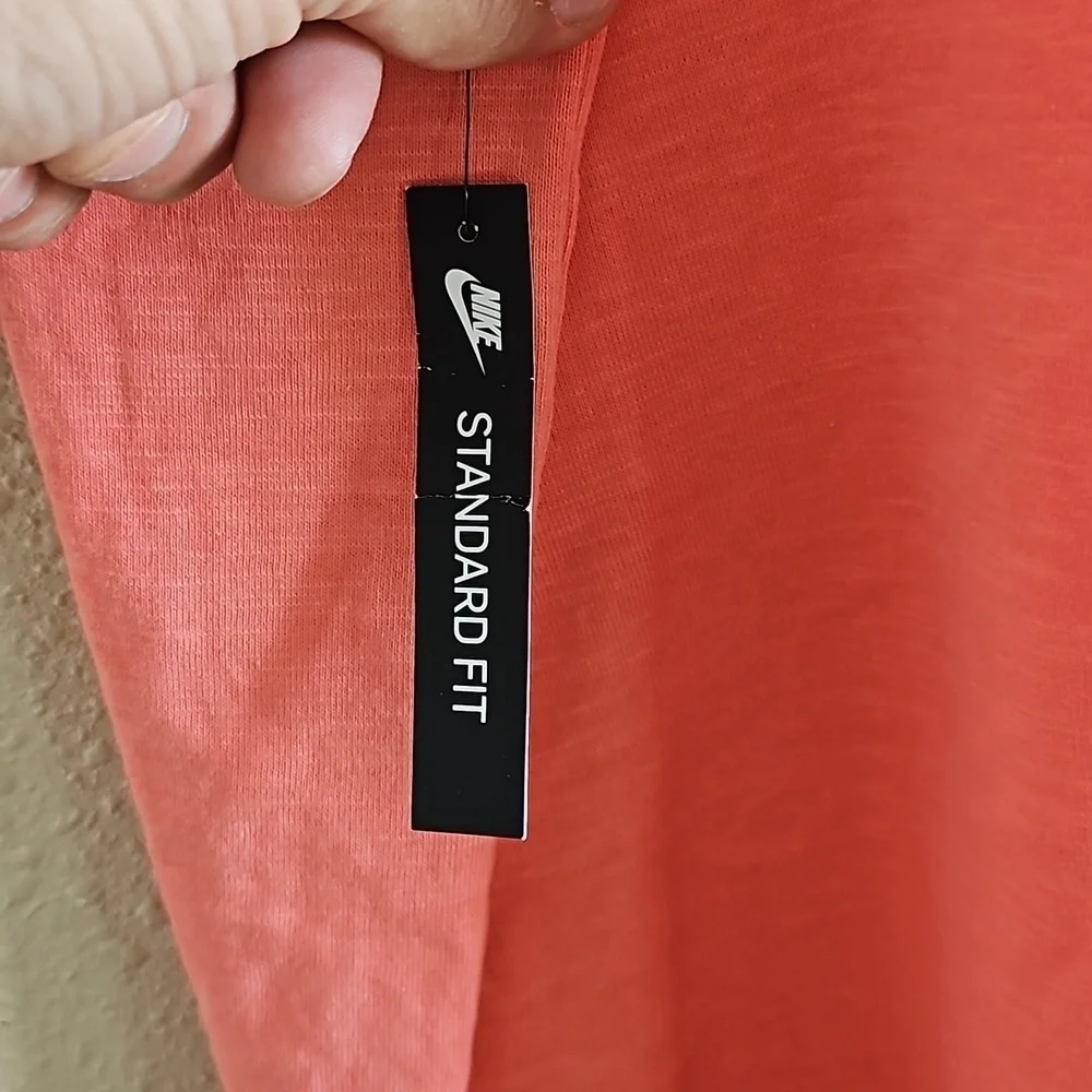 Nike Zip Pocket T-Shirt.
